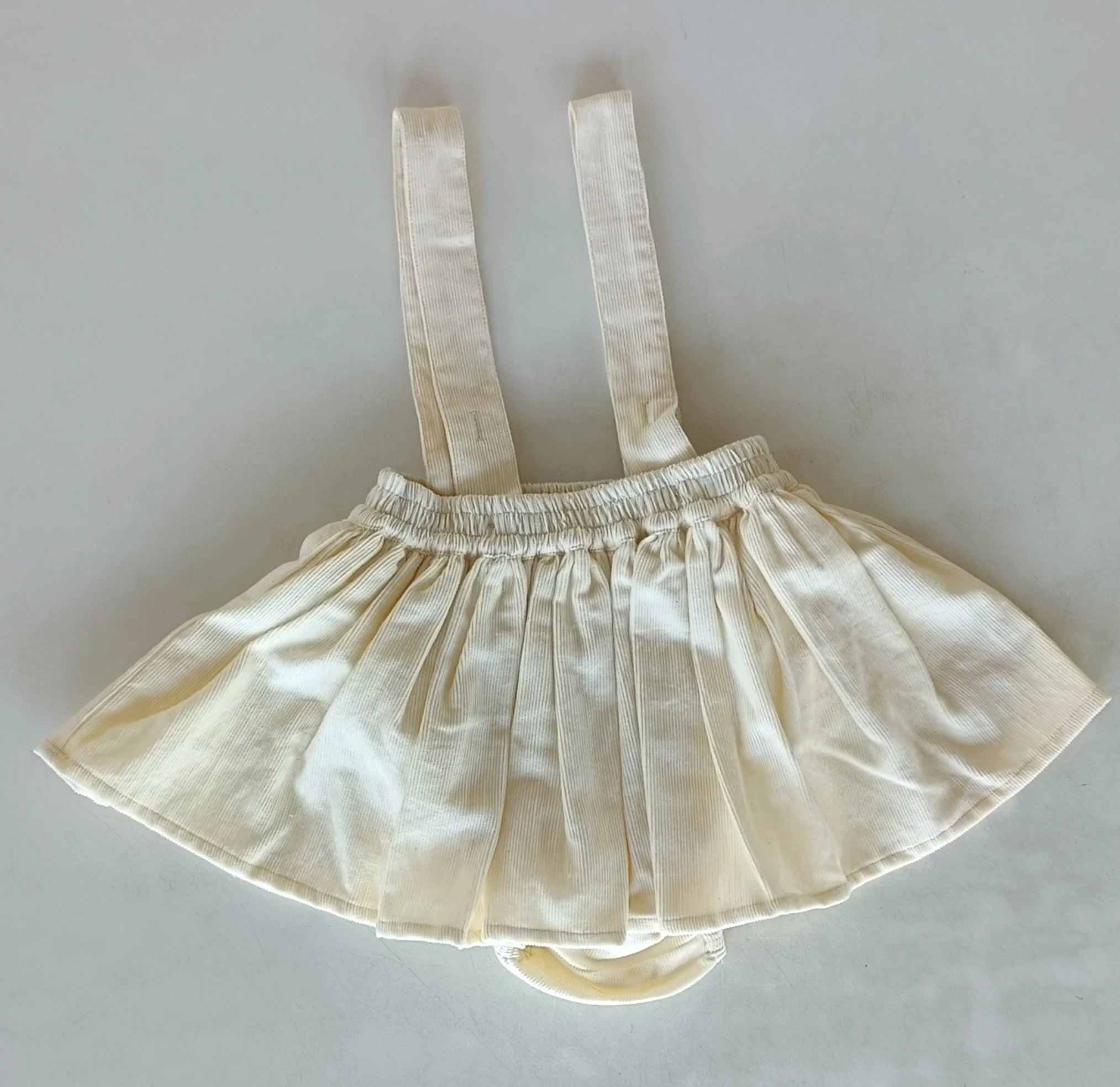 Off White Conduroy Solida Color Baby Skort Offwhite
